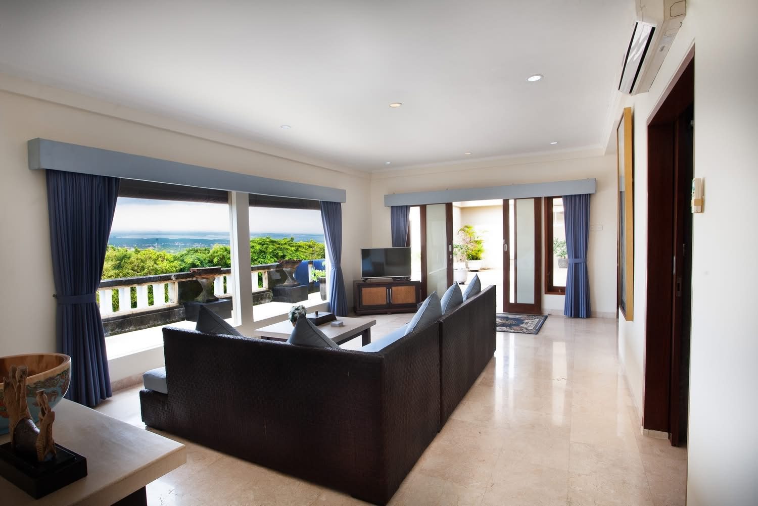 Living room with panoramic hillside view